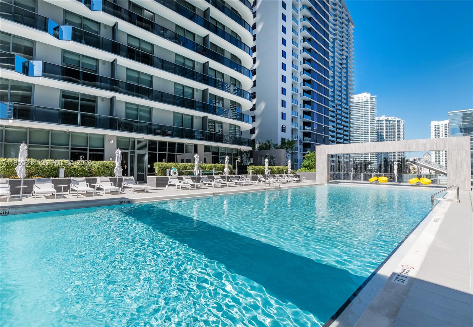 45 Southwest 9th Street, Unit 3401 Miami, FL 33130 - Photo 30 of 36 a view of swimming pool with outdoor seating