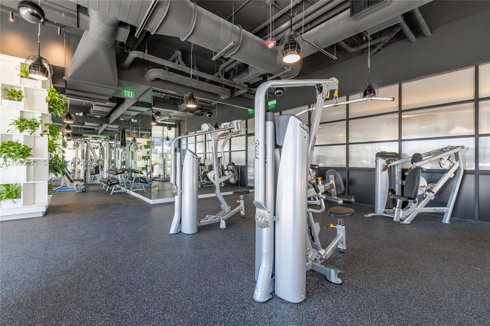 45 Southwest 9th Street, Unit 3401 Miami, FL 33130 - Photo 33 of 36 a view of a room with gym equipment