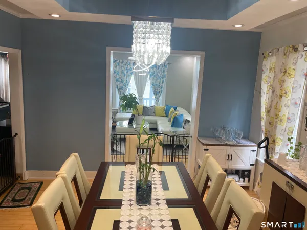 a view of a dining room with furniture window and outside view