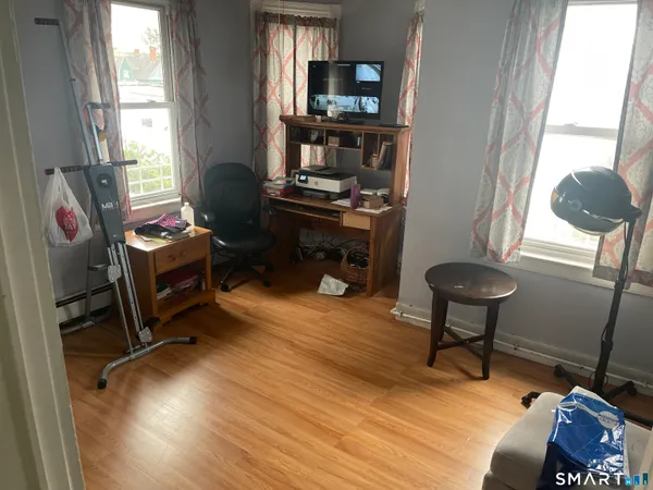 a room with furniture and a window