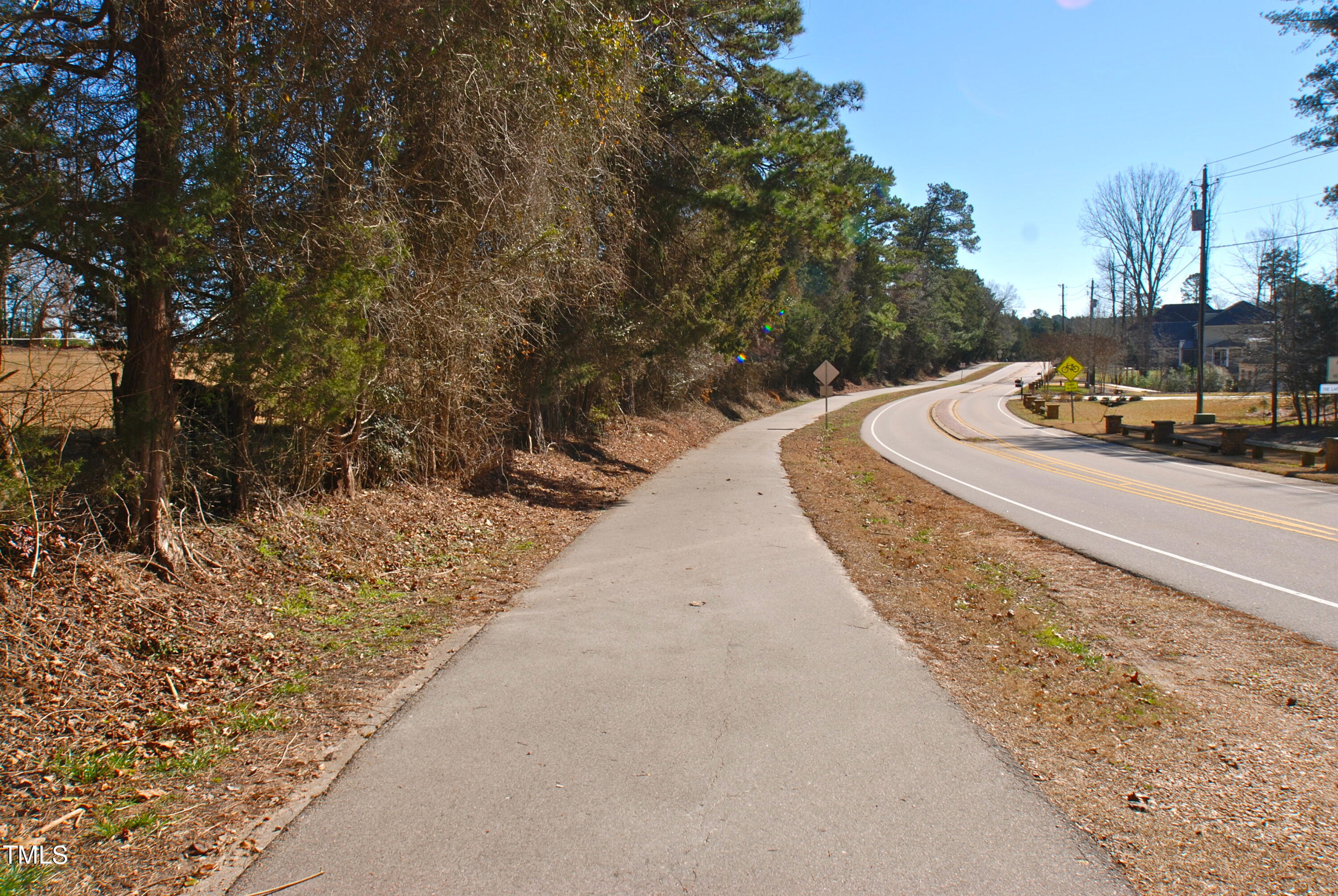 2204 Myron Drive Raleigh, NC 27607 - Photo 54 of 57 a view of a road with a yard