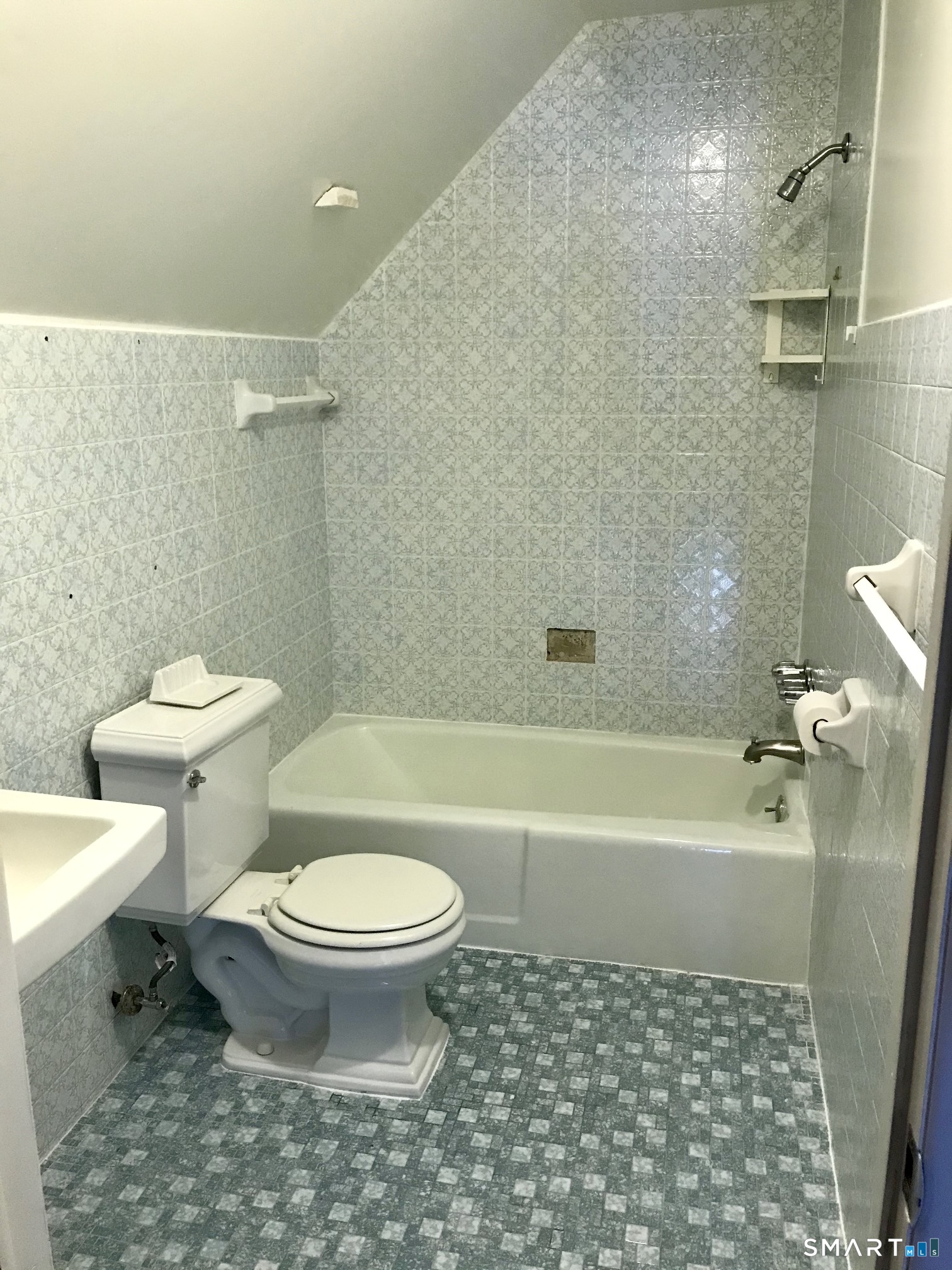 52 Catherine Street Stratford, CT 06615 - Photo 13 of 19 a bathroom with a toilet a sink and bathtub