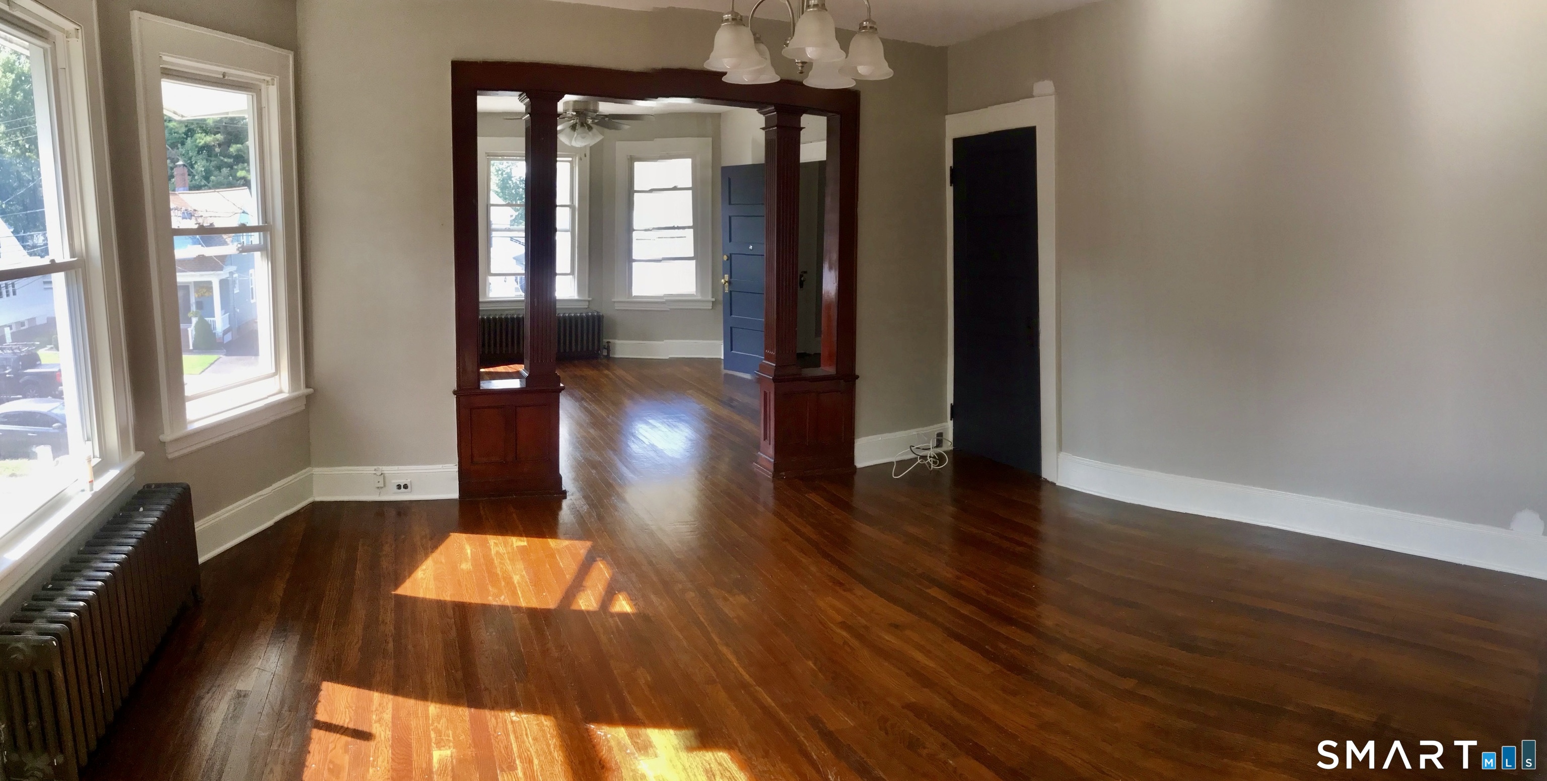 52 Catherine Street Stratford, CT 06615 - Photo 17 of 19 a view of entryway and hall with wooden floor