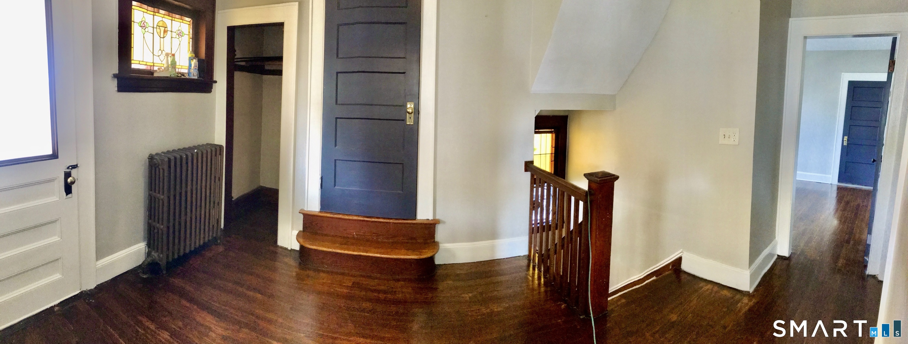 52 Catherine Street Stratford, CT 06615 - Photo 2 of 19 a view of front door with wooden floor