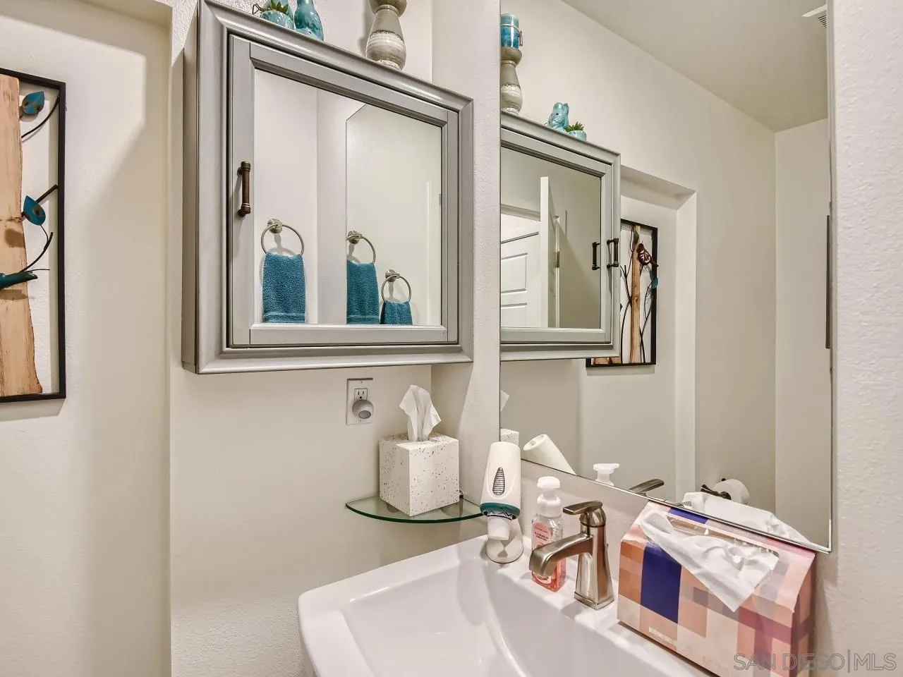 9069 West Bluff Place Santee, CA 92071 - Photo 16 of 45 a living room with furniture and decor