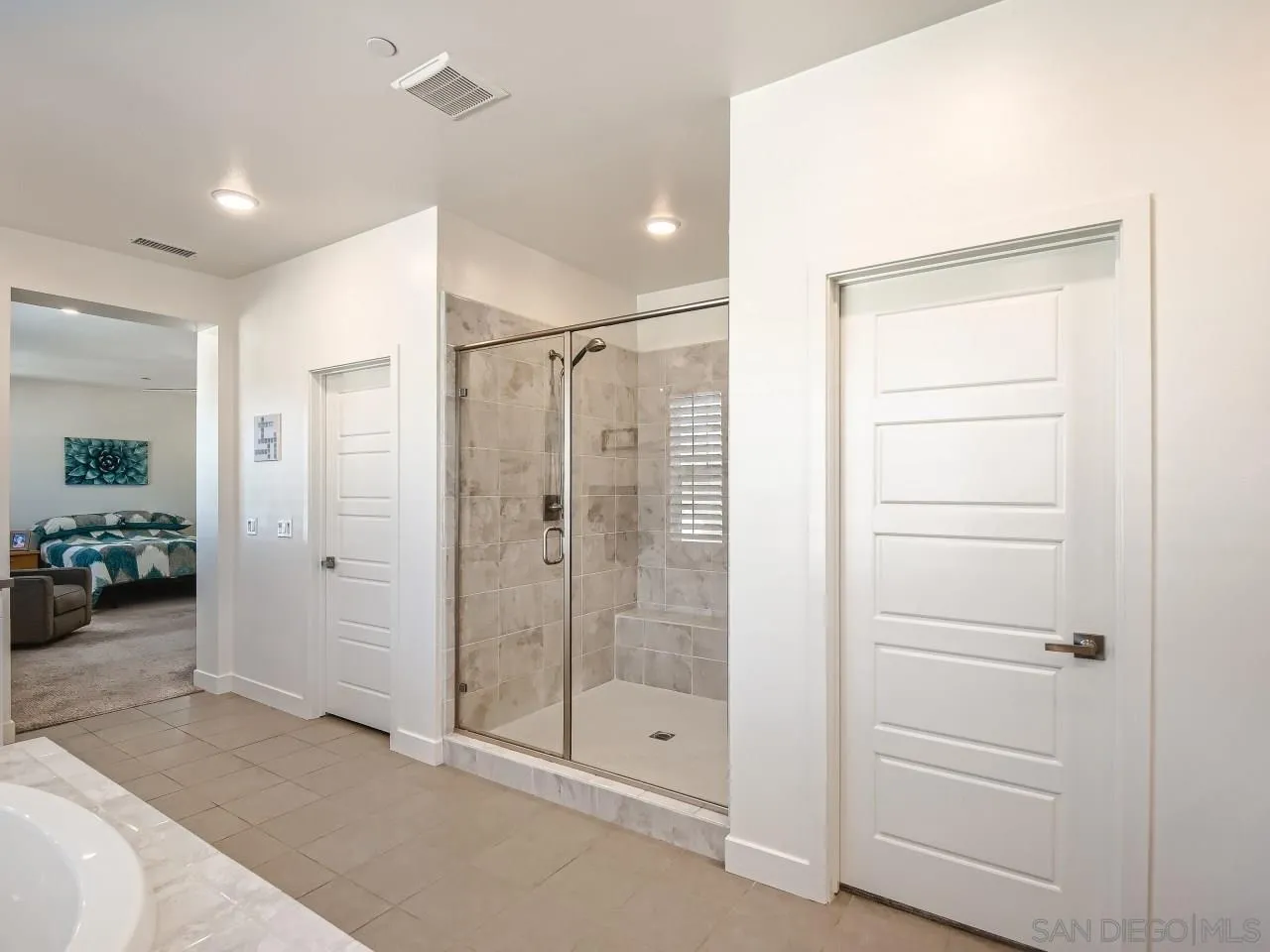9069 West Bluff Place Santee, CA 92071 - Photo 21 of 45 a bathroom with a shower
