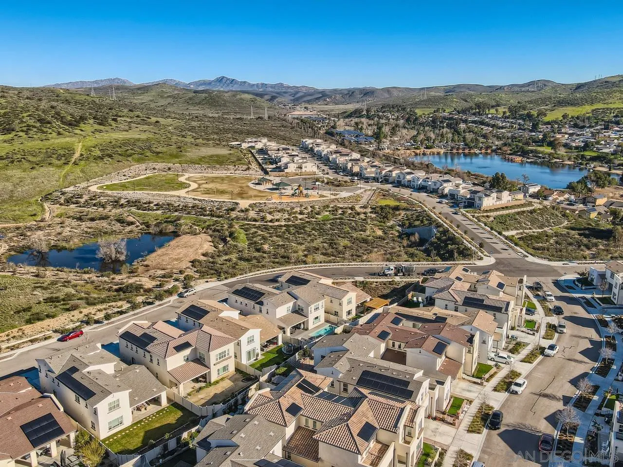9069 West Bluff Place Santee, CA 92071 - Photo 41 of 45 an aerial view of residential building with parking space
