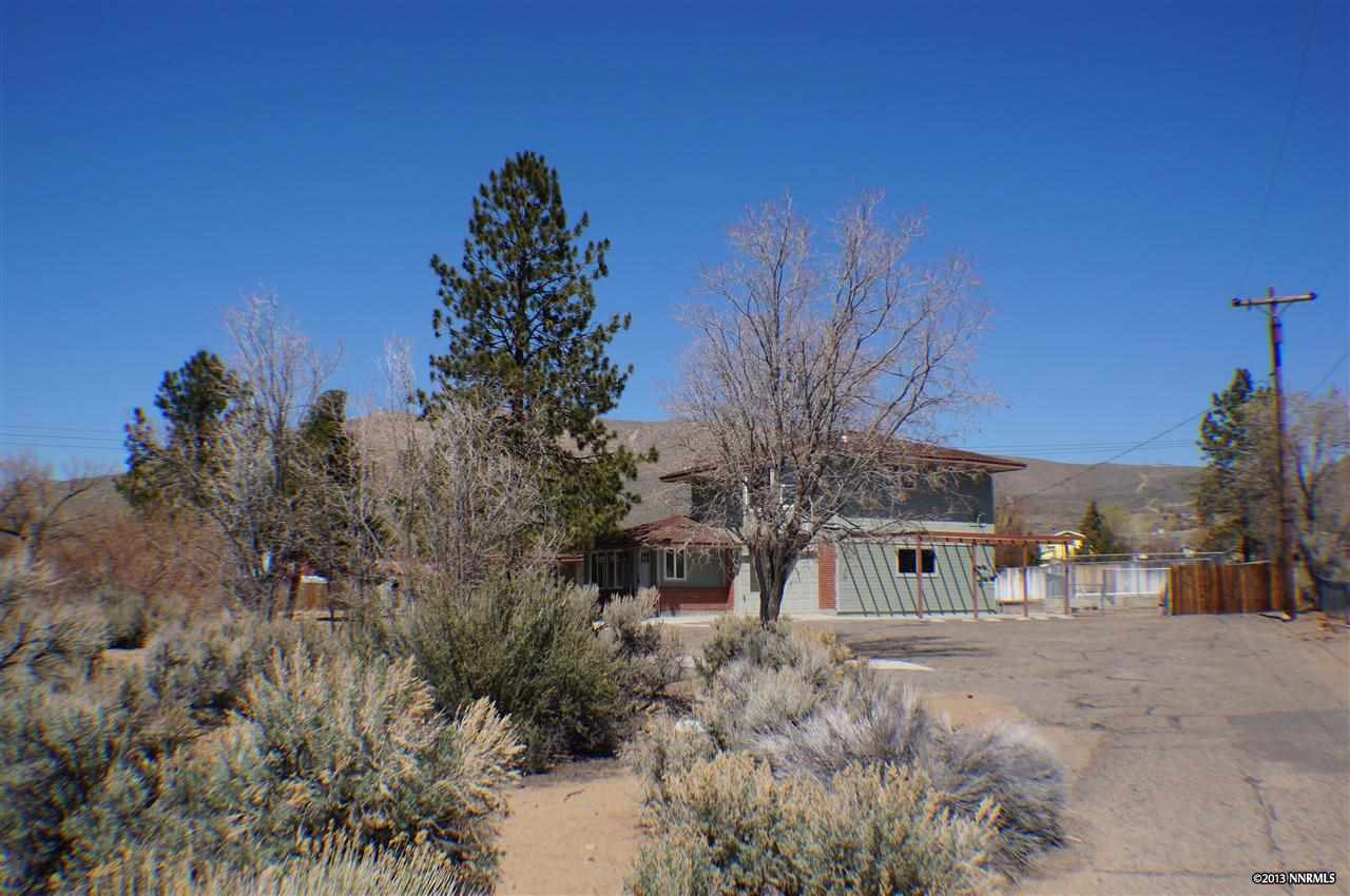 1050 Holly Way Carson City, NV 89706 - Photo 1 of 1 a view of a house with a yard