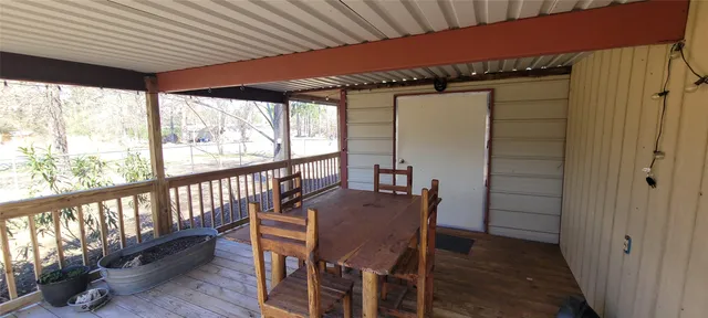 a view of a balcony dining area