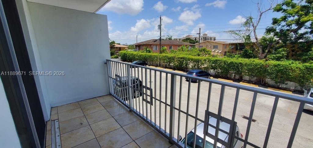 445 Southwest 11th Street, Unit 203 Miami, FL 33130 - Photo 14 of 18 a view of a balcony