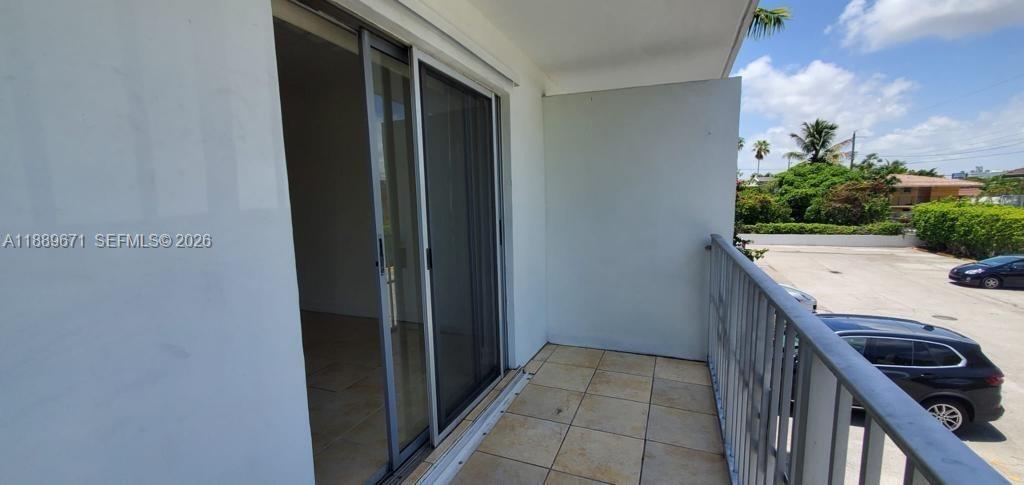 445 Southwest 11th Street, Unit 203 Miami, FL 33130 - Photo 15 of 18 a balcony with view of outdoor space