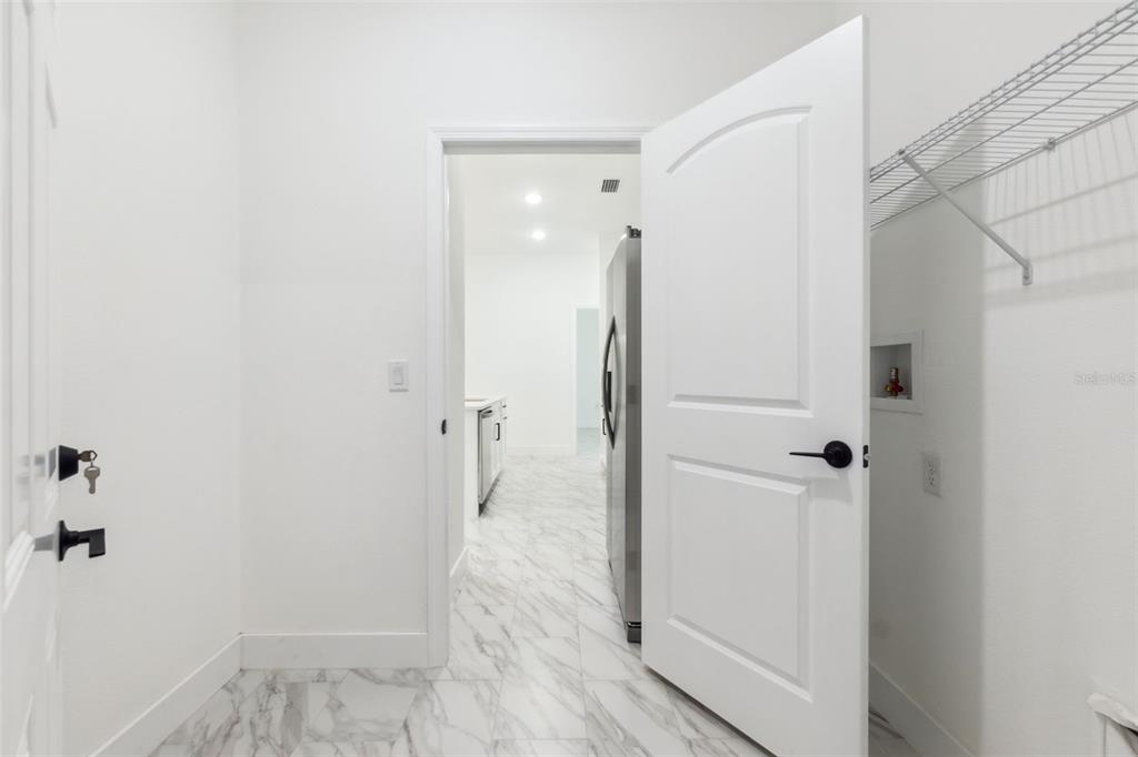 8 Cleat Court Placida, FL 33946 - Photo 8 of 24 a bathroom with a shower and a glass door