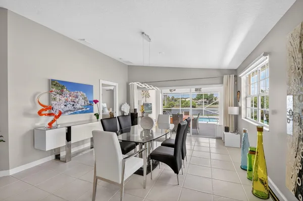 a bathroom with a double vanity sink toilet mirror and shower