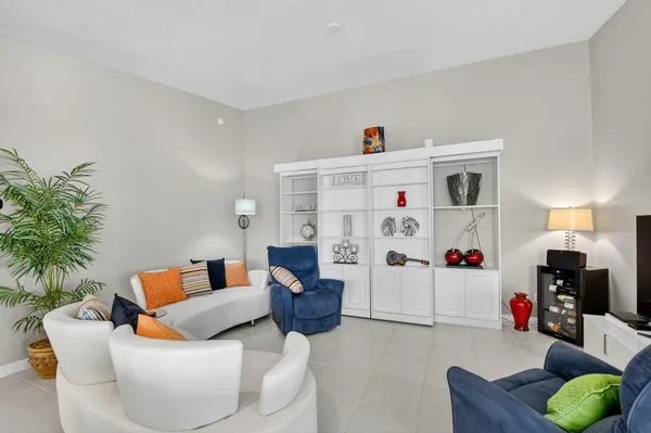 a bathroom with a sink toilet double vanity and shower