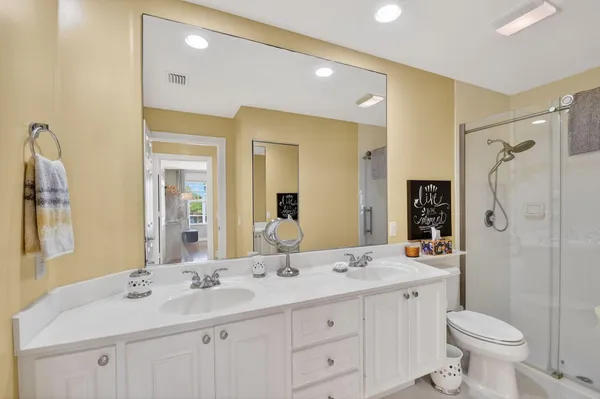 a view of tree in front of a house