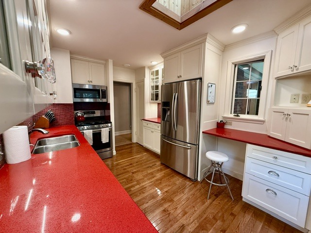 720 South New Street Champaign, IL 61820 - Photo 22 of 73 a kitchen with stainless steel appliances granite countertop a refrigerator sink and stove