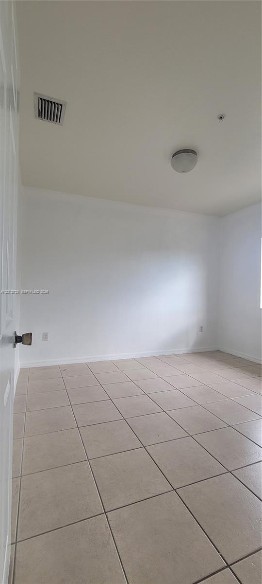 33 East 20th Street, Unit 206 Hialeah, FL 33010 - Photo 11 of 15 a view of an empty room