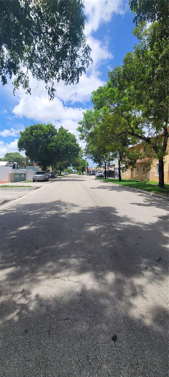 33 East 20th Street, Unit 206 Hialeah, FL 33010 - Photo 2 of 15 a view of a yard with a tree