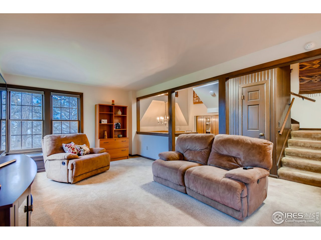 6325 Red Hill Road Boulder, CO 80302 - Photo 15 of 40 a living room with furniture and a large window