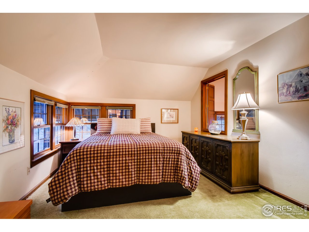 6325 Red Hill Road Boulder, CO 80302 - Photo 17 of 40 a bedroom with a bed and dresser