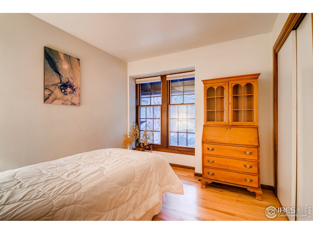 6325 Red Hill Road Boulder, CO 80302 - Photo 23 of 40 a bedroom with a bed and a window