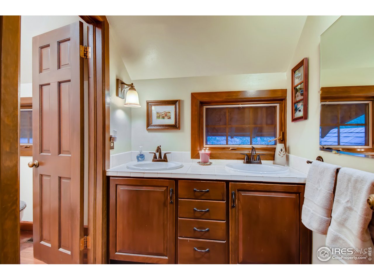 6325 Red Hill Road Boulder, CO 80302 - Photo 25 of 40 a kitchen with stainless steel appliances a sink and cabinets