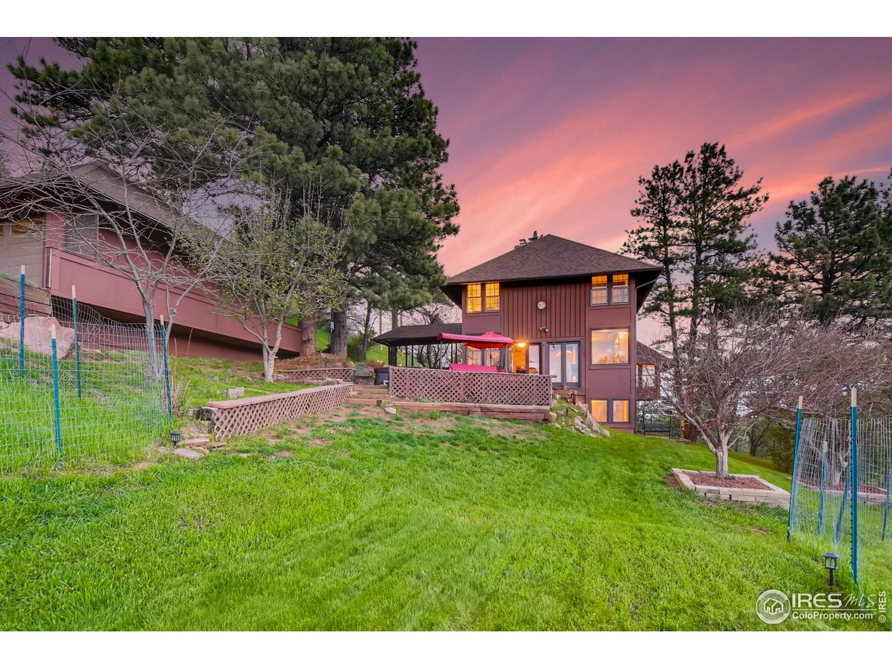 6325 Red Hill Road Boulder, CO 80302 - Photo 28 of 40 a view of a house with a yard porch and sitting area