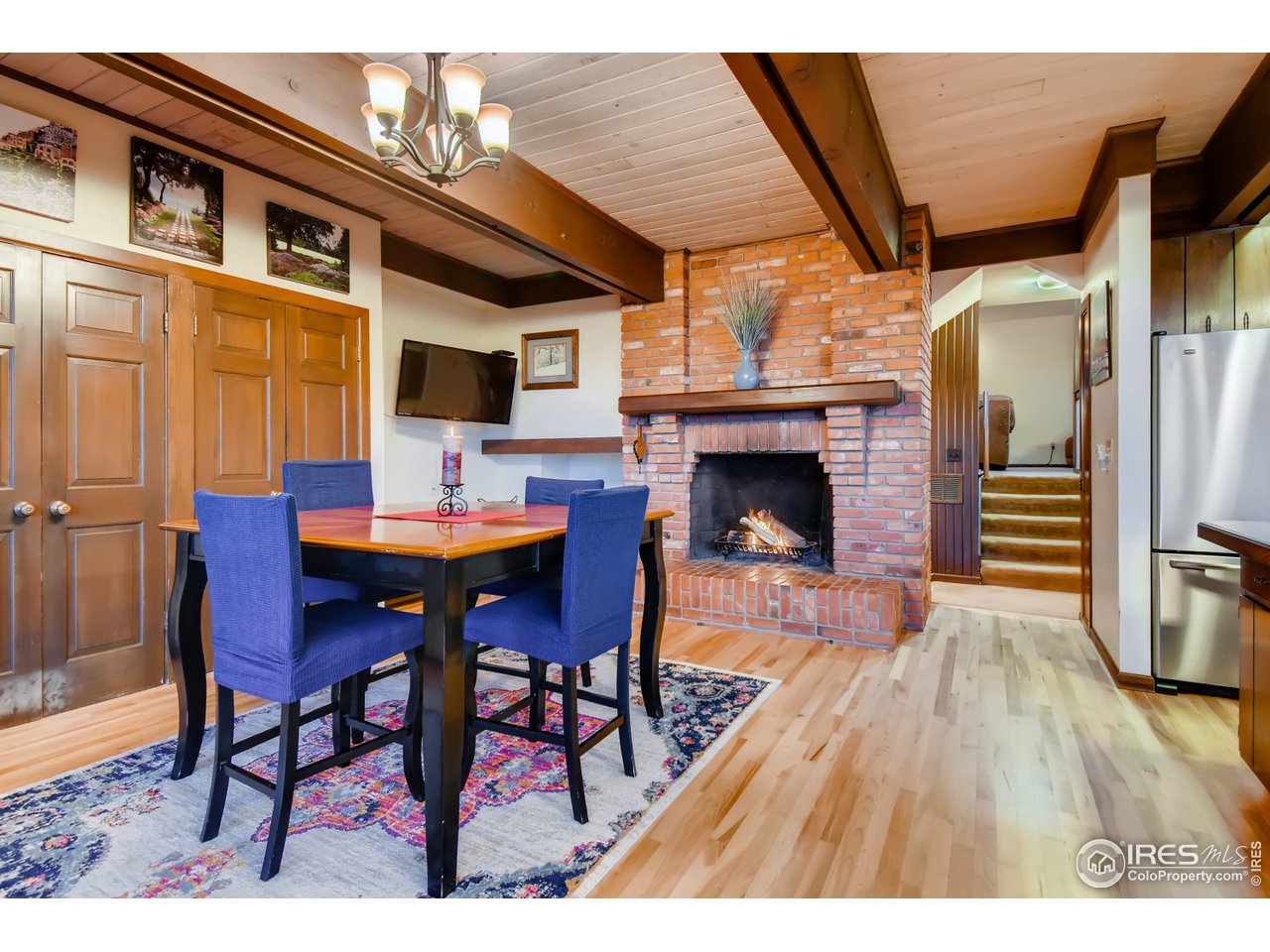 6325 Red Hill Road Boulder, CO 80302 - Photo 4 of 40 a outdoor dining space with furniture and wooden floor