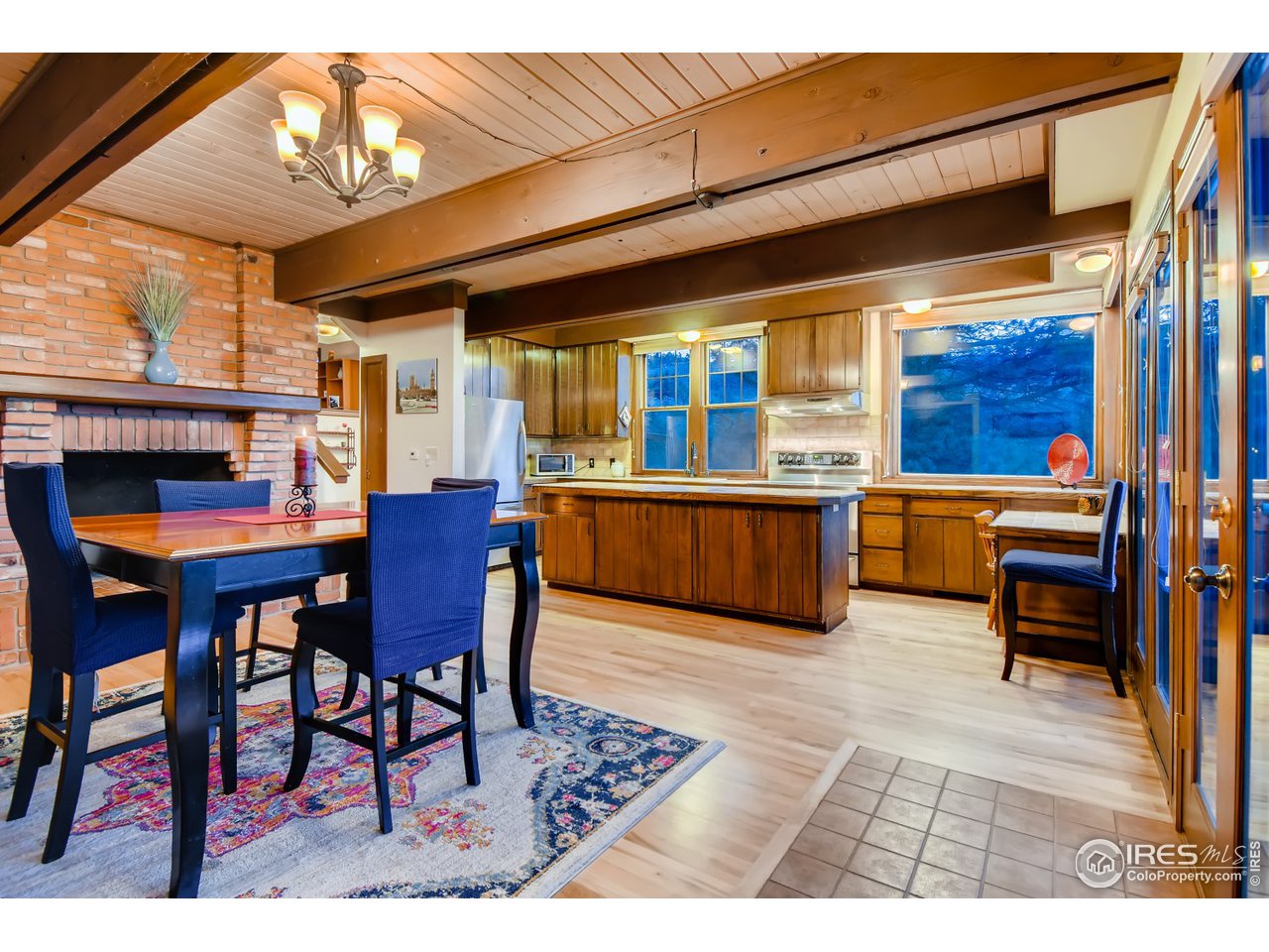 6325 Red Hill Road Boulder, CO 80302 - Photo 5 of 40 a view of a dining room with furniture window and outside view