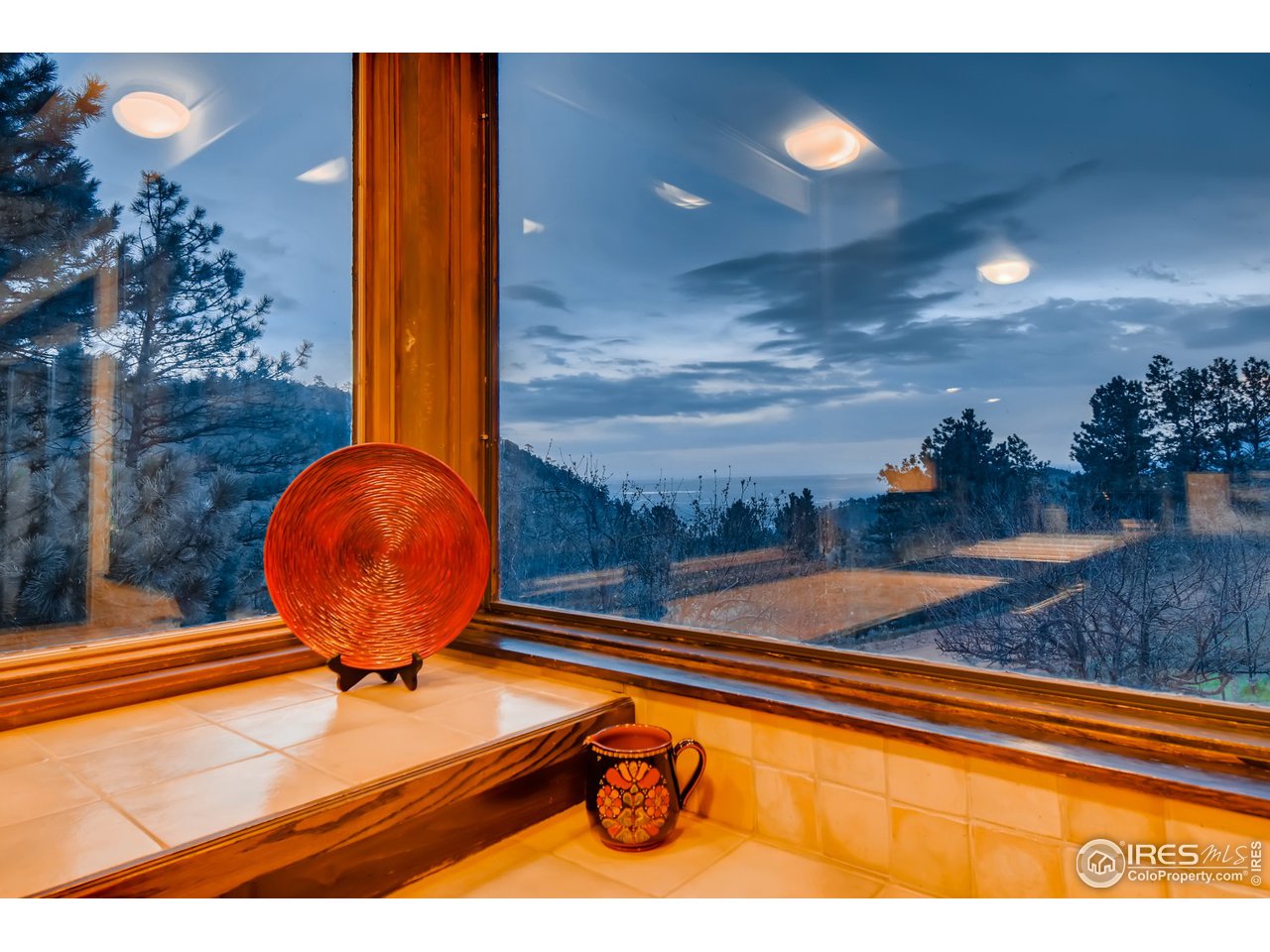 6325 Red Hill Road Boulder, CO 80302 - Photo 10 of 40 a bathroom with a sink and mirror