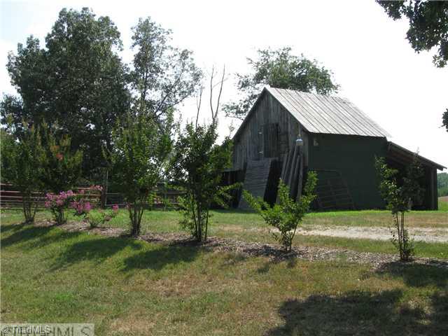 190 Southern Road Stokesdale, NC 27357 - Photo 15 of 16 Stable/Barn. Wired Barn with Water, too! 2 Stalls (4 animals each)