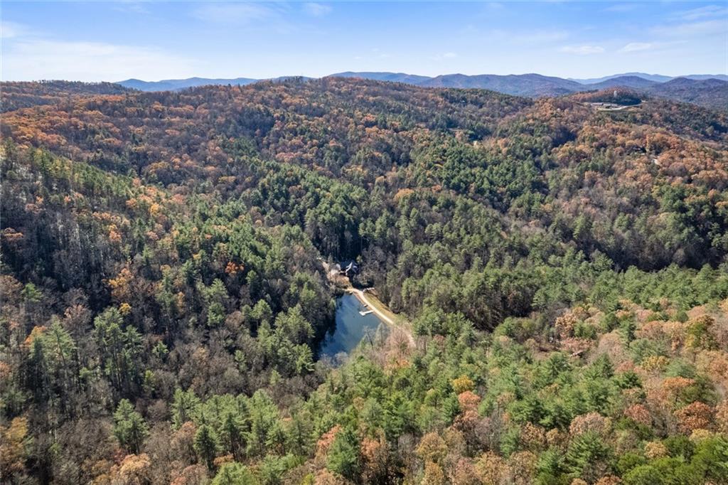 0 Raven Ridge Road Clayton, GA 30525 - Photo 4 of 19 an aerial view of residential house and green space