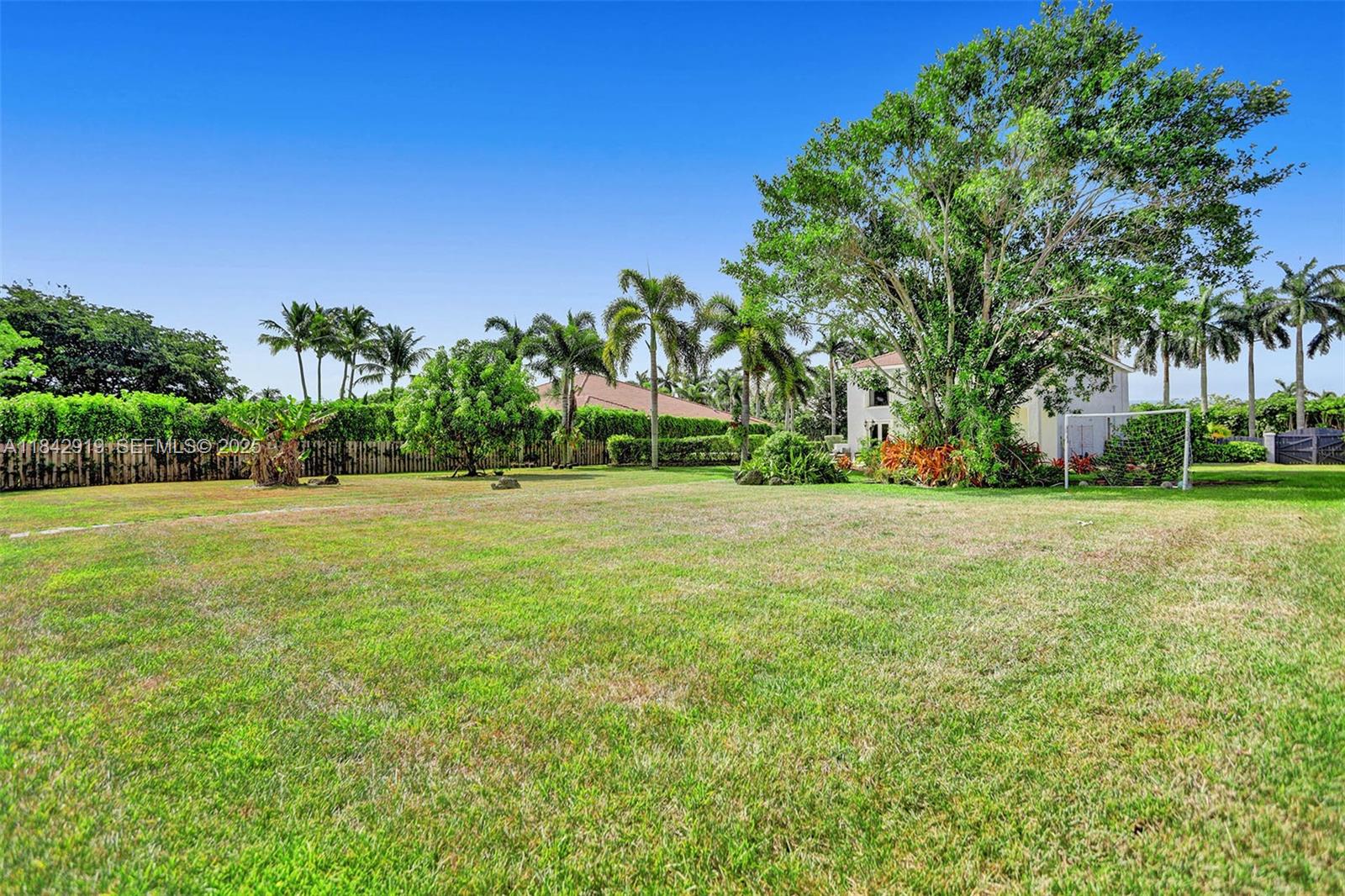 721 Ranch Road Weston, FL 33326 - Photo 16 of 38 a view of a park with large trees