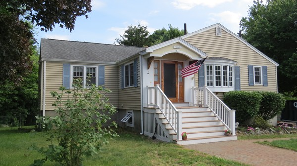 8 Manomet Road Woburn, MA 01801 - Photo 1 of 16 a view of house with a yard and potted plants