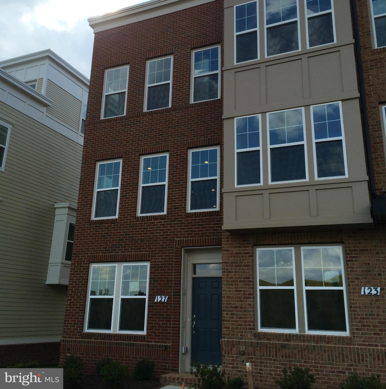 127 Decoverly Drive Gaithersburg, MD 20878 - Photo 1 of 30 a tall building with a window