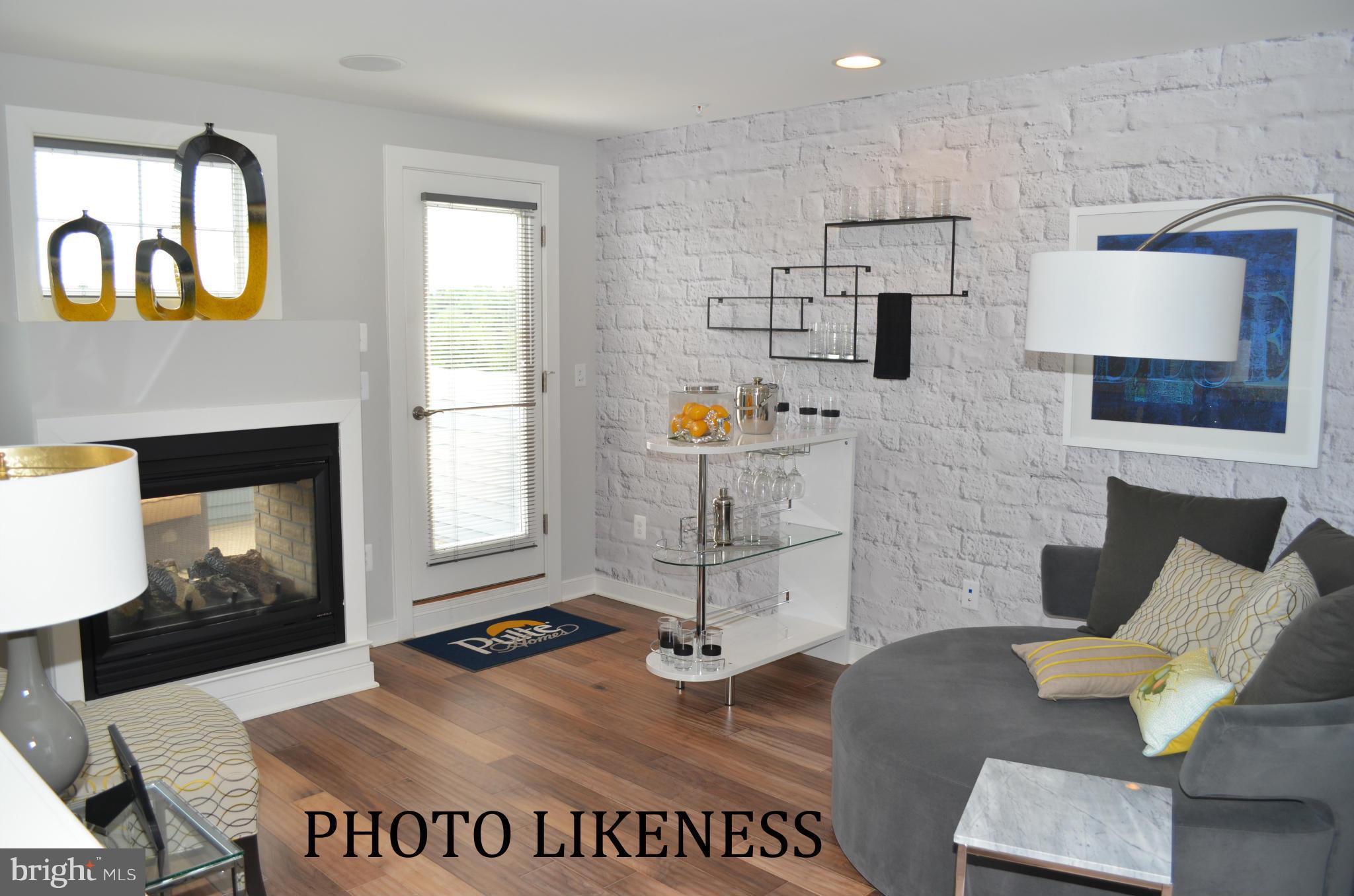 127 Decoverly Drive Gaithersburg, MD 20878 - Photo 2 of 30 a living room with furniture and a fireplace