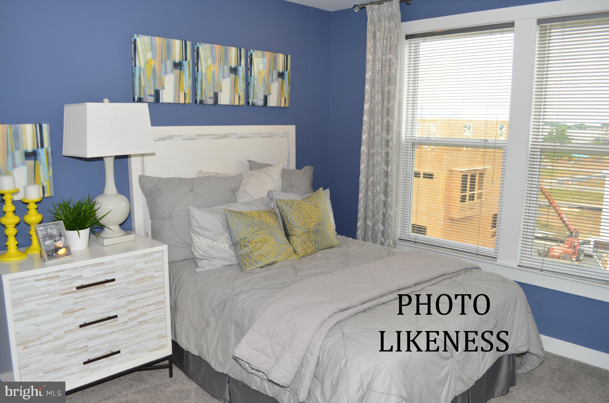 127 Decoverly Drive Gaithersburg, MD 20878 - Photo 27 of 30 a bedroom with a bed and a window