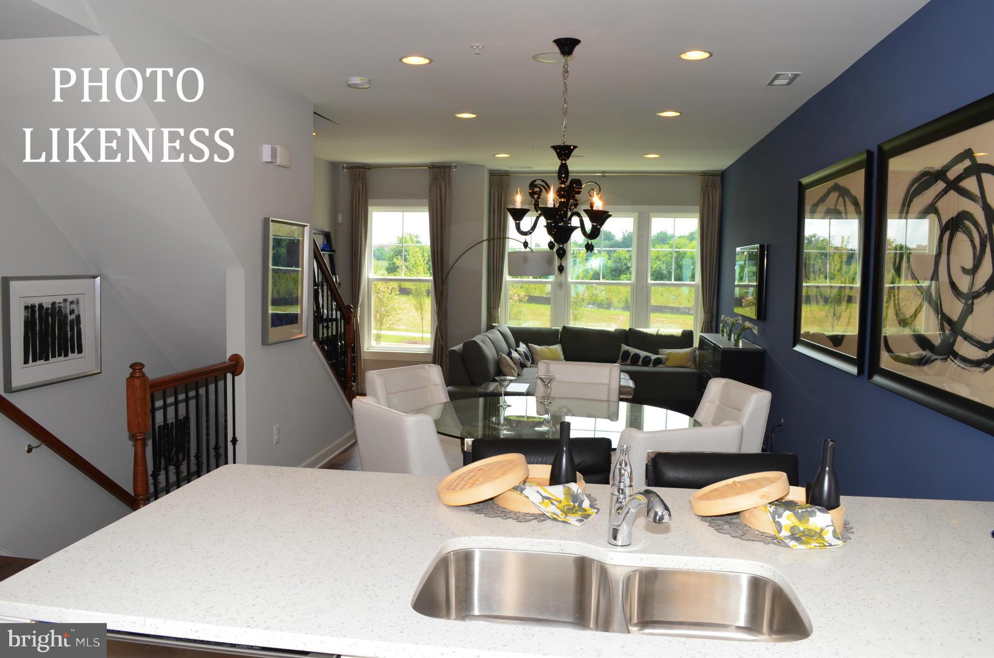 127 Decoverly Drive Gaithersburg, MD 20878 - Photo 9 of 30 a outdoor dining space with furniture and floor to ceiling window