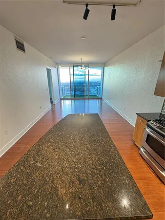 a view of an empty room and window