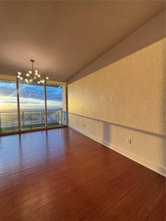 a view of a livingroom with wooden floor