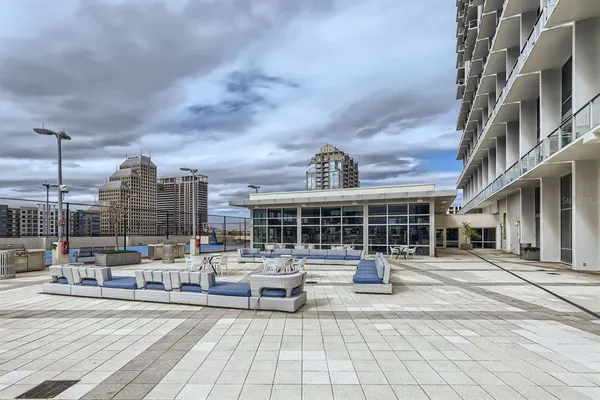 a room with lots of table and chairs