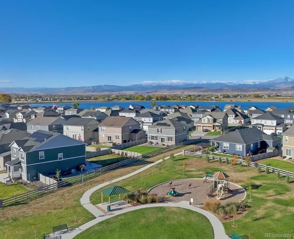 a view of a city with lawn chairs
