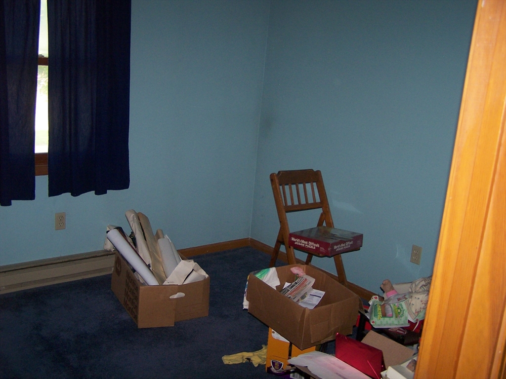 94 Lower Gore Road Webster, MA 01570 - Photo 15 of 19 a living room with furniture and a window
