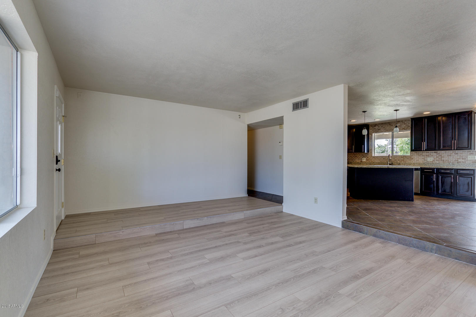 2155 East Decatur Street Mesa, AZ 85213 - Photo 5 of 24 Livingroom opens to the kitchen