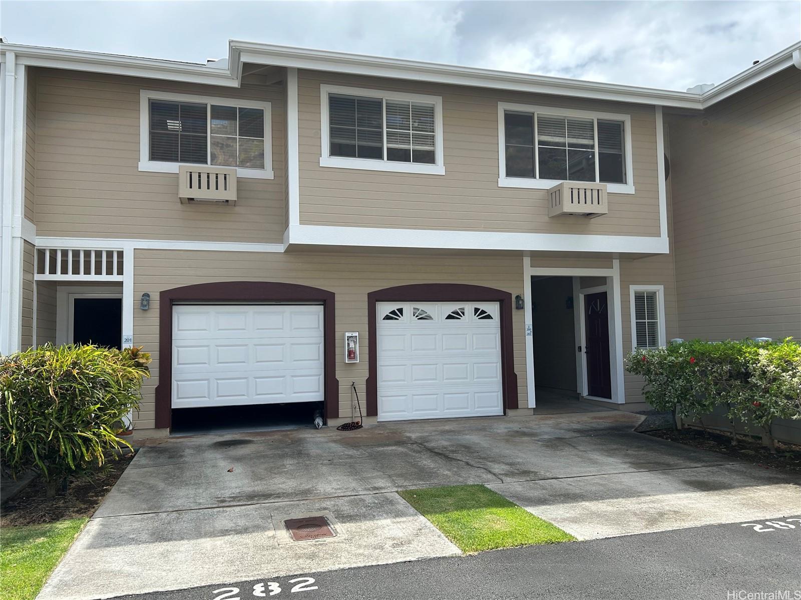 7150 Hawaii Kai Drive, Unit 202 Honolulu, HI 96825 - Photo 1 of 14 a front view of a house