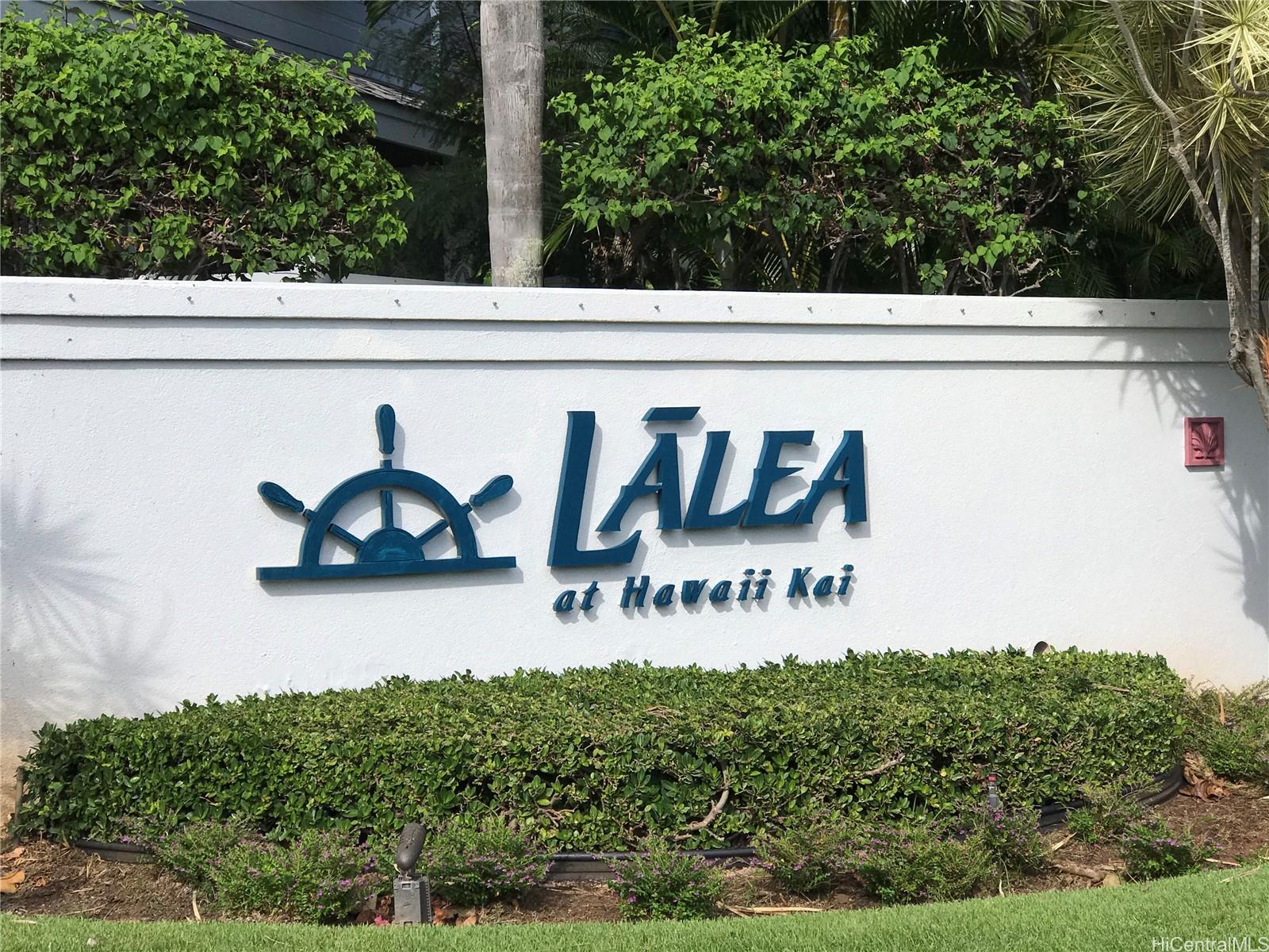 7150 Hawaii Kai Drive, Unit 202 Honolulu, HI 96825 - Photo 2 of 14 a sign on the side of a building