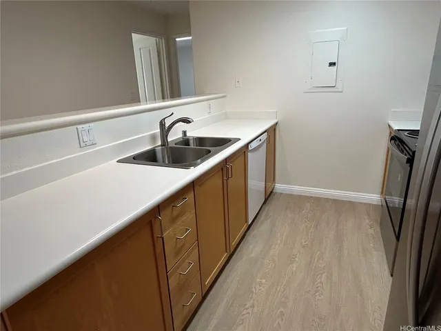 a bathroom with a sink and mirror