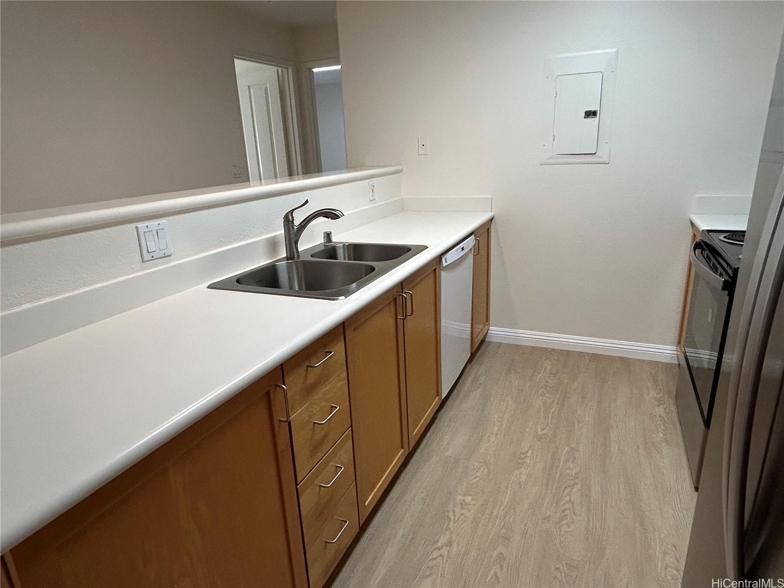 7150 Hawaii Kai Drive, Unit 202 Honolulu, HI 96825 - Photo 5 of 14 a bathroom with a sink and mirror
