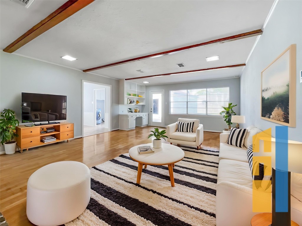 9206 Sharpview Drive Houston, TX 77036 - Photo 1 of 27 a living room with furniture and a flat screen tv