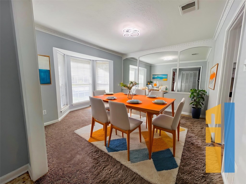 9206 Sharpview Drive Houston, TX 77036 - Photo 2 of 27 a dining room with furniture and window